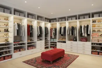 Closet planejado aberto com iluminação embutida e divisões personalizadas - Art Closet